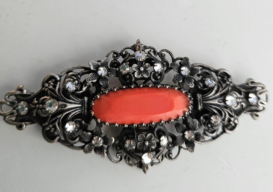 Vintage brosch silver med orange sten