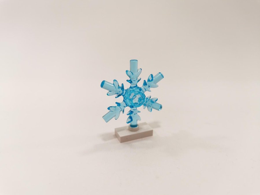 Lego - transparent - snöflinga - 4x4 - part x789 - ljusblå (trans light blue)