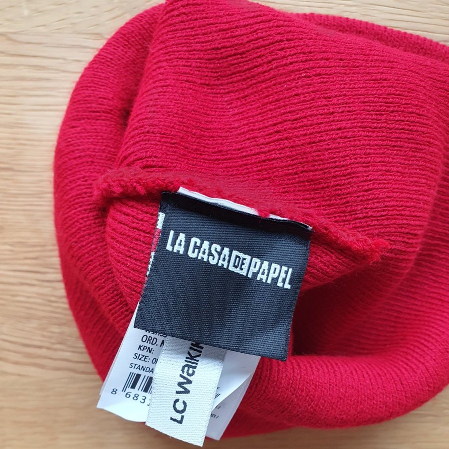 Oanvänd "La Casa de Papel" röd mössa, storlek ONE SIZE