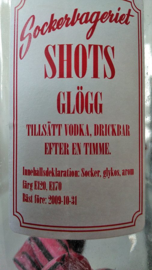 Glasflaska med patentlock "Sockerbageriet SHOTS GLÖGG" - inte använd