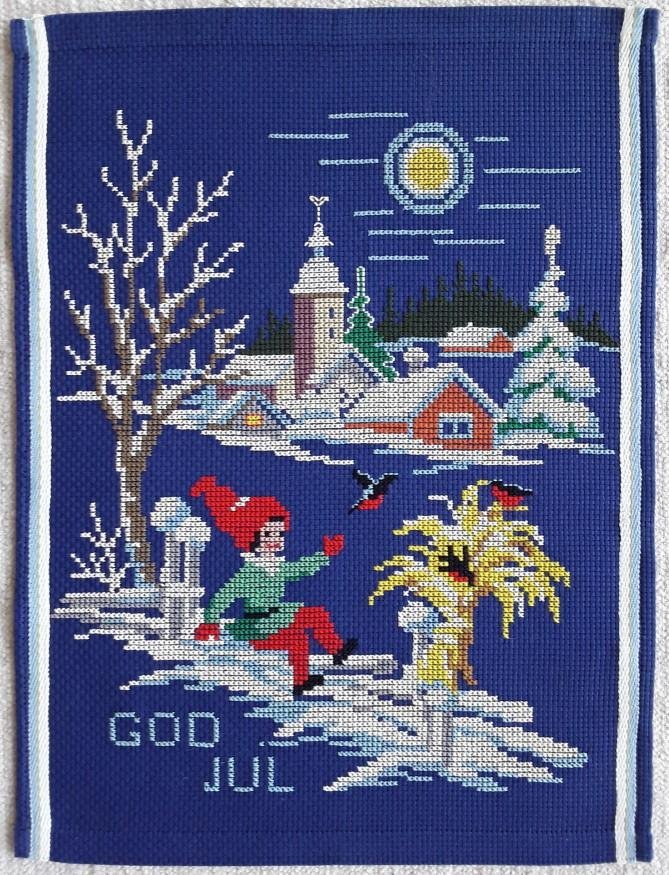 Broderad bonad / vepa med tomte och kärve