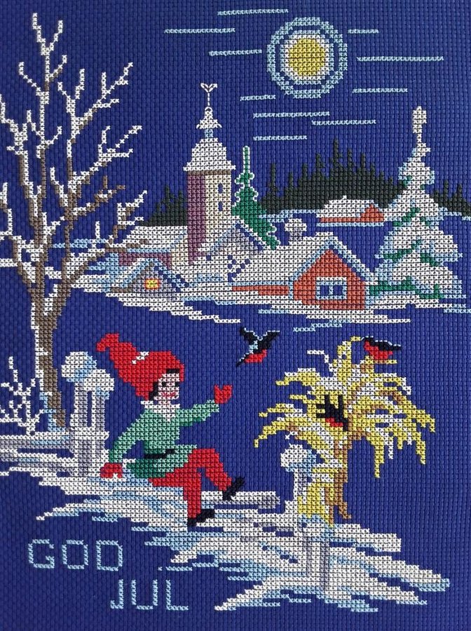 Broderad bonad / vepa med tomte och kärve