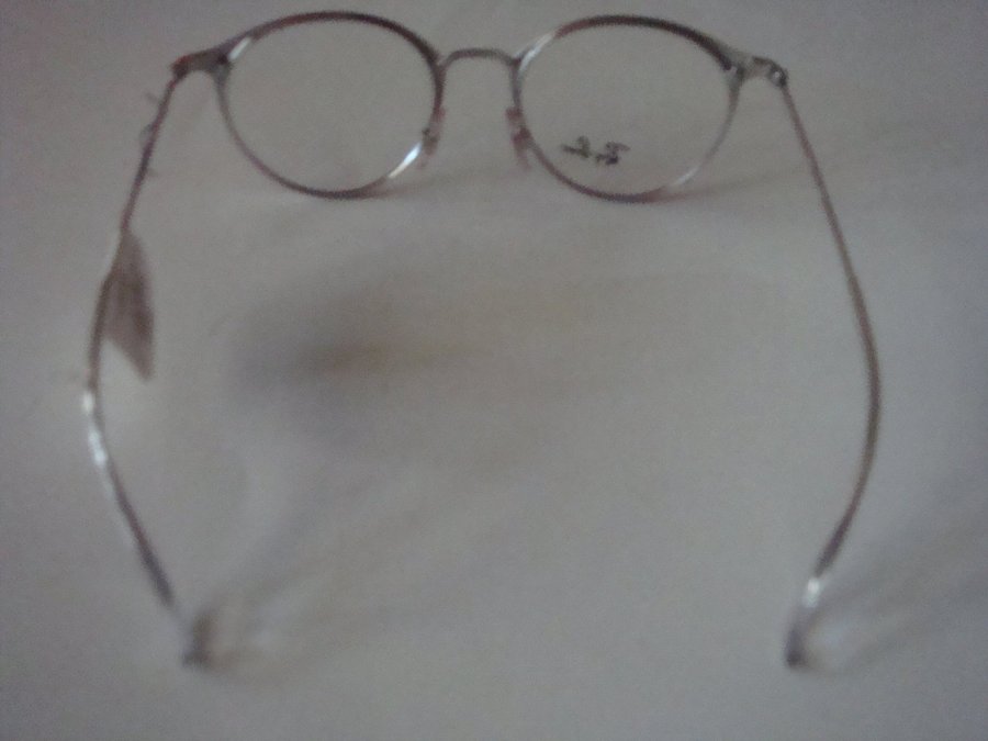 Ray-Ban Round Metal RX1053K Eyeglasses frames.