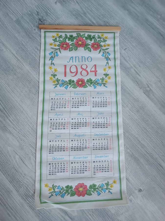 Kalenderbonad i tyg 1984