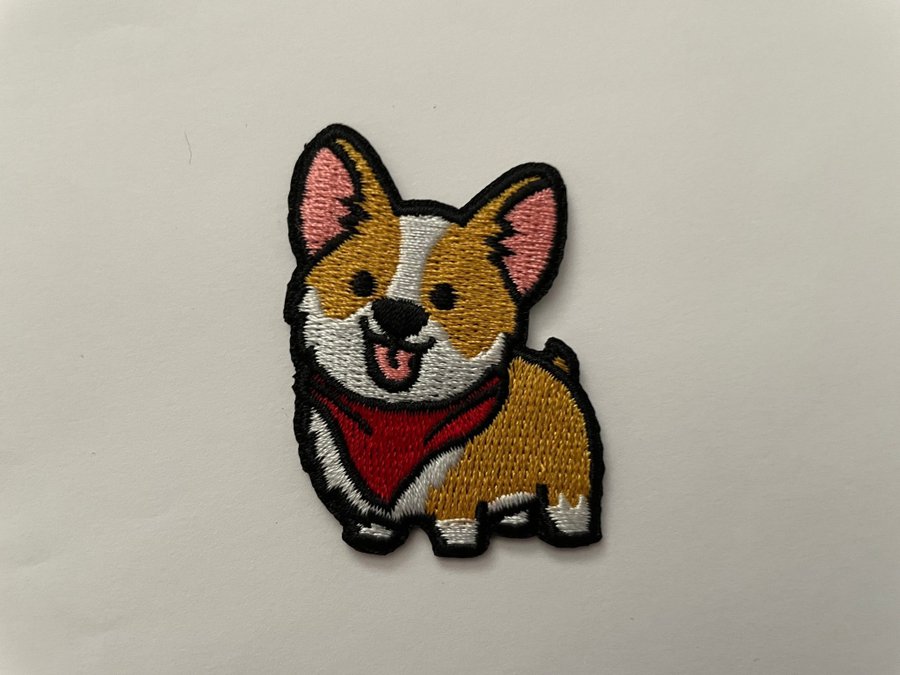 HUND CORGI TYGMÄRKE