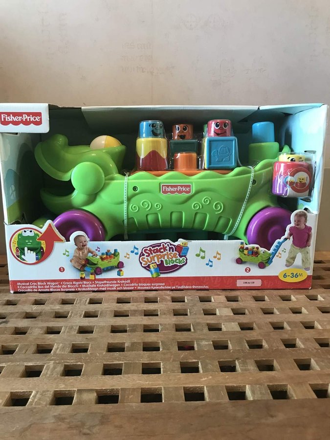 Fisher-Price Krokodilbil med musik 6-36 m Stack`n surprise blocks