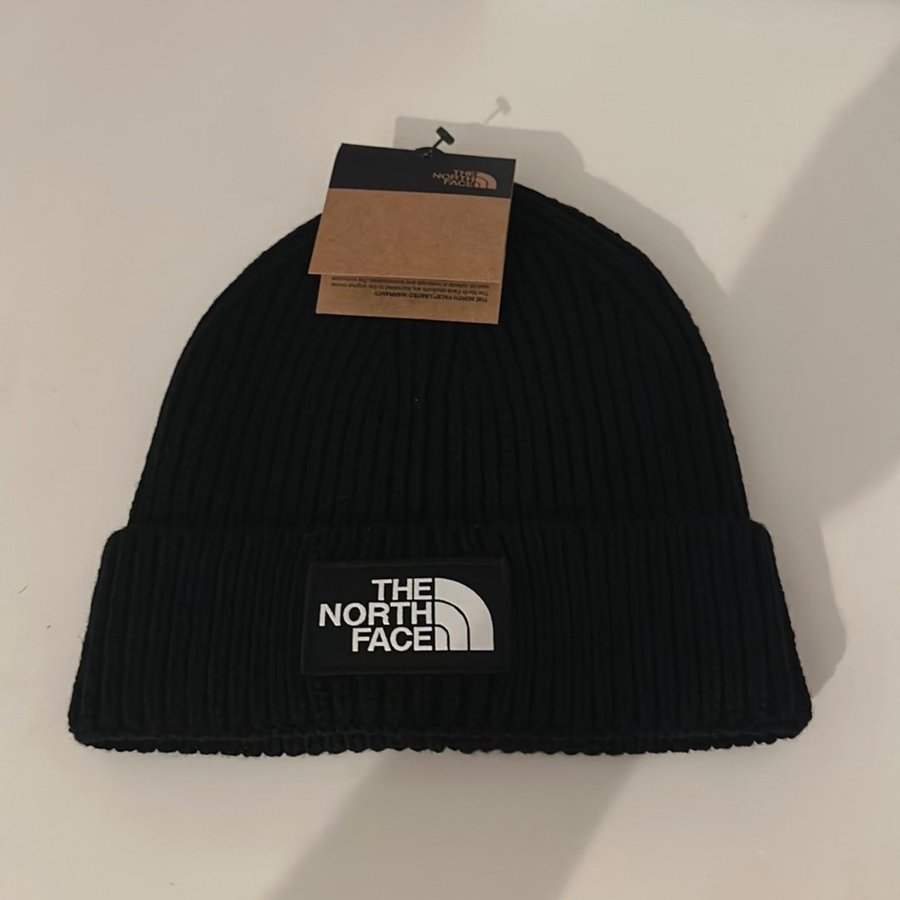 The North Face sort hue