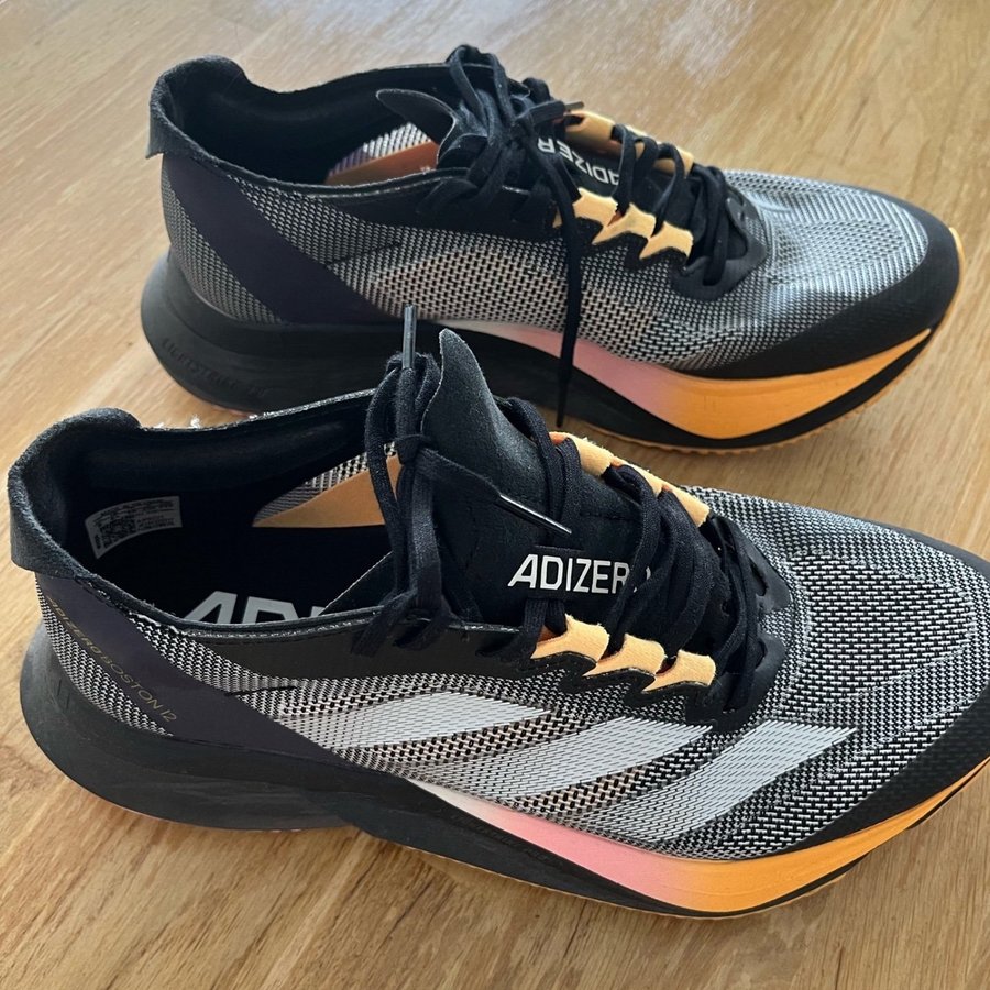 Adidas Adizero Boston 12 W Löparskor Svart/Gul/rosa