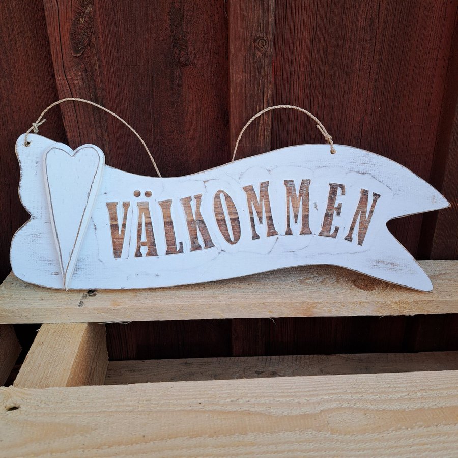 Välkomstskylt med hjärta