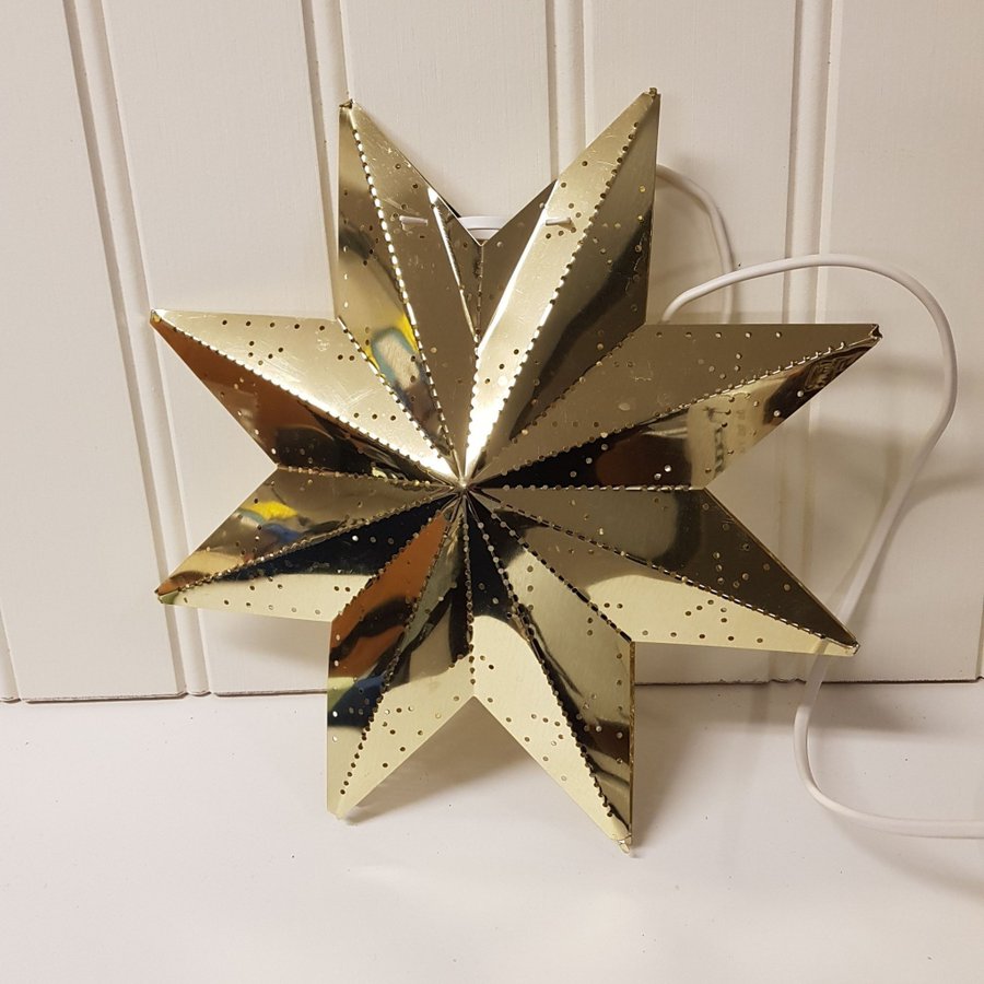 Adventsstjärna mässingsfärgad.ca 30 cm .