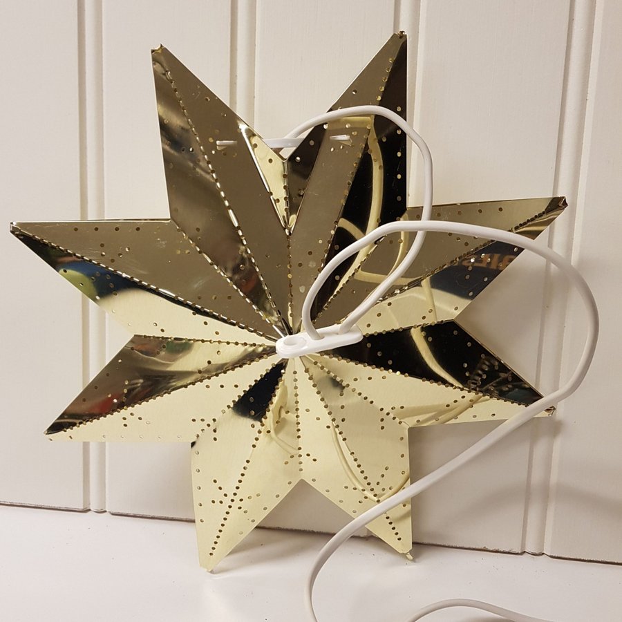 Adventsstjärna mässingsfärgad.ca 30 cm .