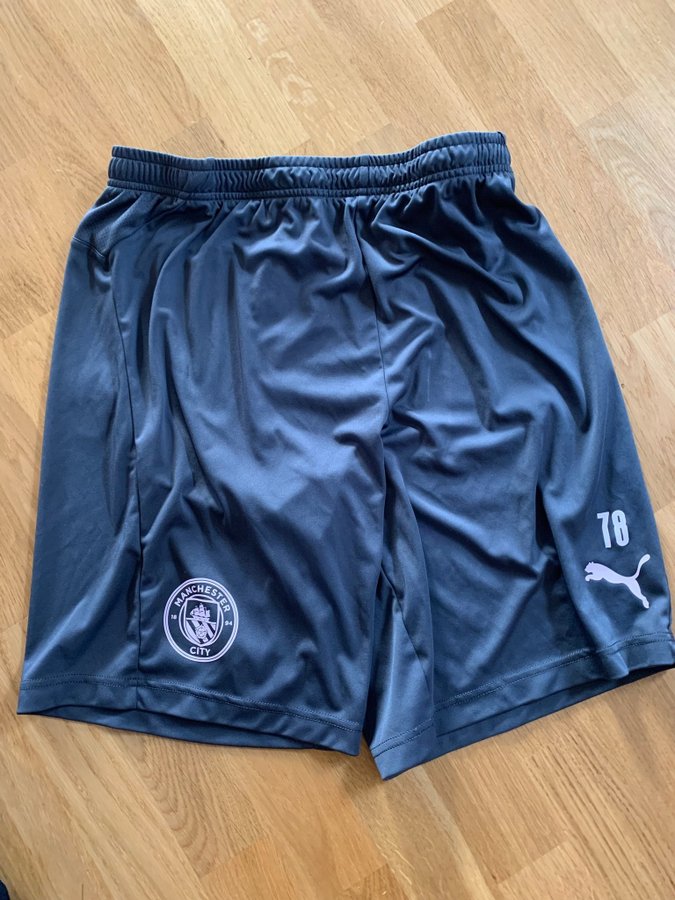 Manchester City, Puma fotbollshorts, storlek L. Fotboll.