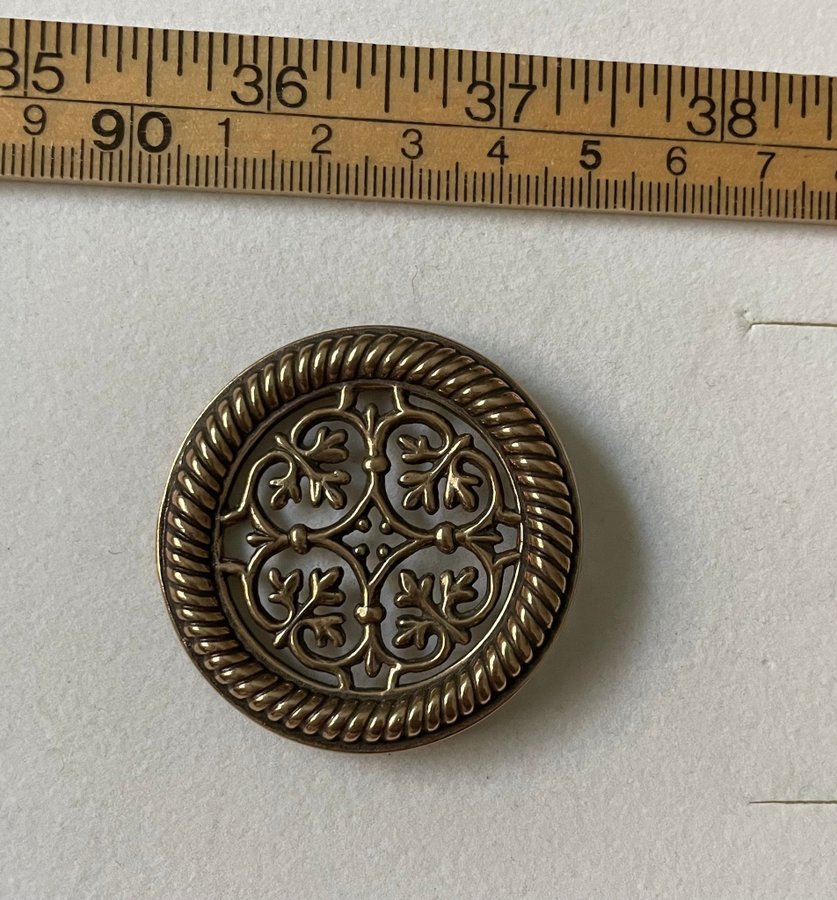 Kalevala brooch