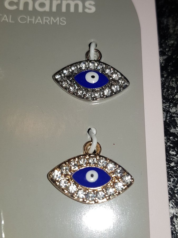 Hängen charms 2 par ögon, evil eye  ovala, guld- och silverfärgade med strass