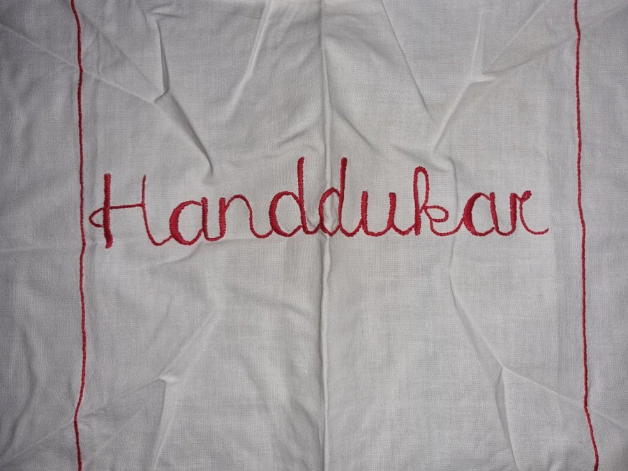 Paradhandduk handbroderad text "handdukar"