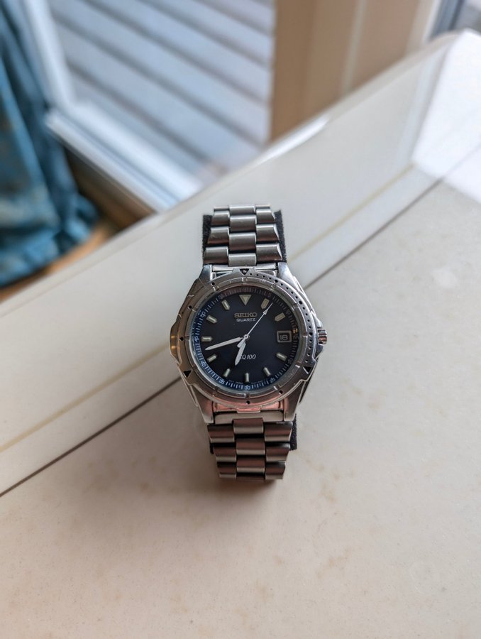 Seiko SQ100 Kvarts Herrarmbandsur