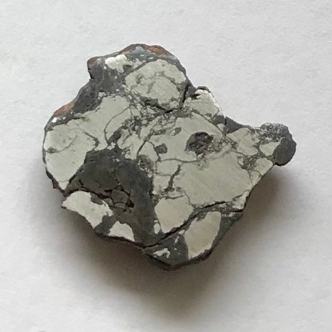 Ultra sällsynt meteorit - CB Carbonaceous - NWA 4025 - 3,10g - ändskärning