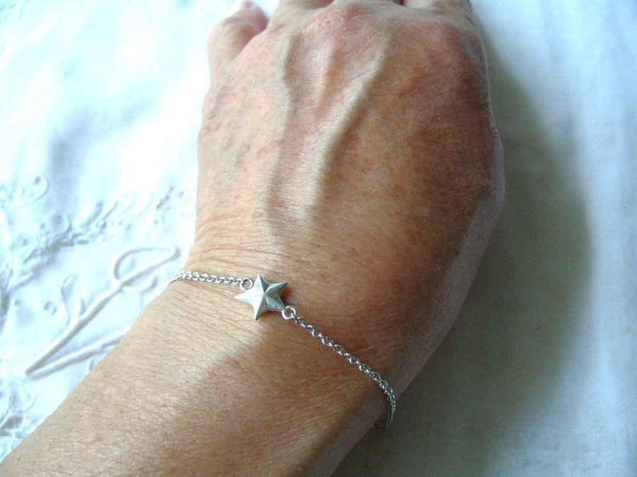 Efva Attling design: "Catch a falling star bracelet" 925 silver justb längd