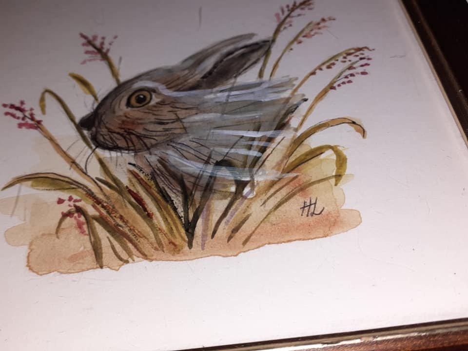 Liten handmålad bild med en söt liten kanin