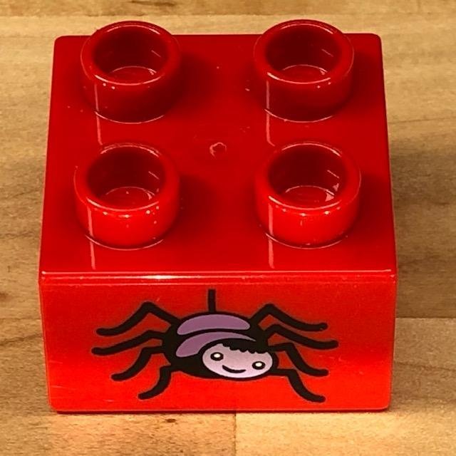 LEGO Duplo klossar/delar "röd kloss 2x2 med spindel" - begagnat från Peklek!