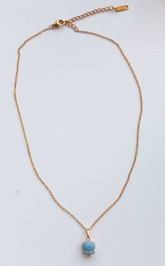 Beautiful chain neckles golden color with sky blue stones