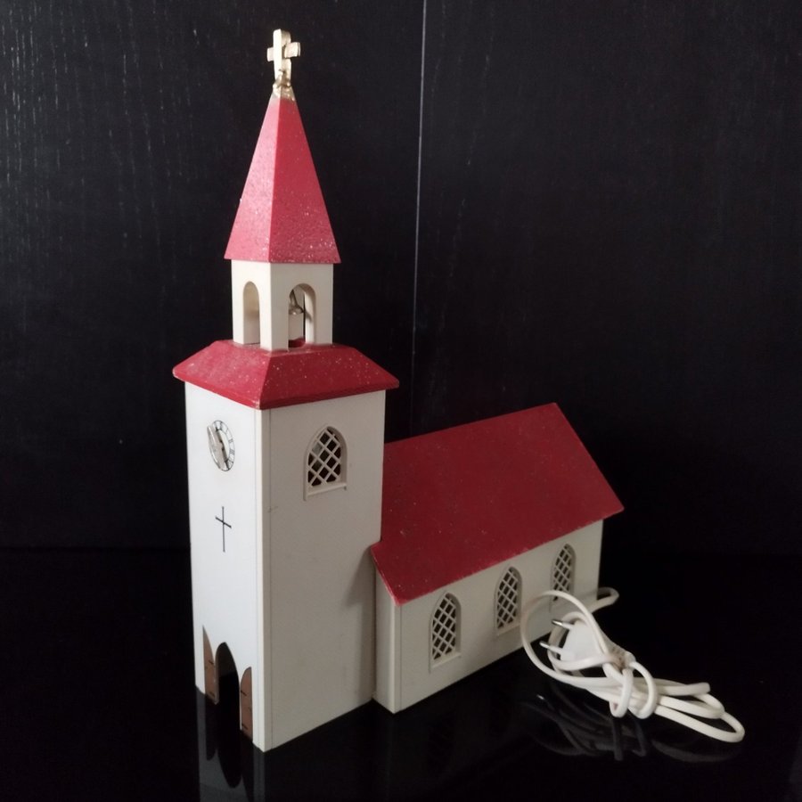 Retro- Julkyrka adventskyrka med belysning samt spelverk röd färg.