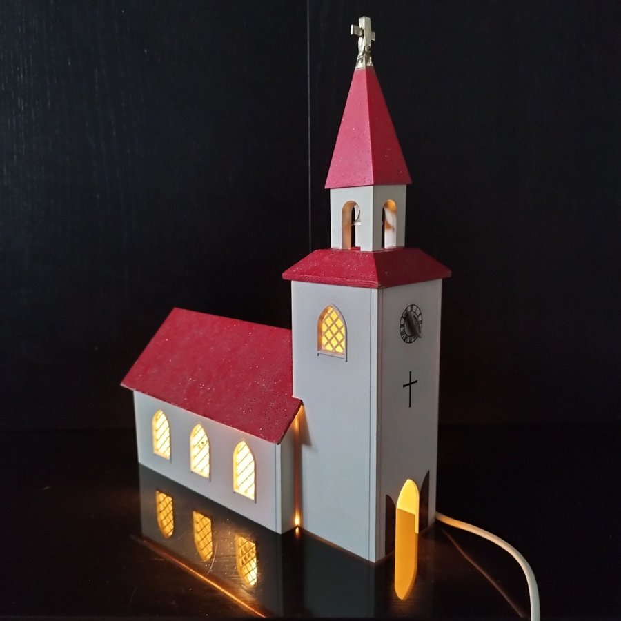 Retro- Julkyrka adventskyrka med belysning samt spelverk röd färg.