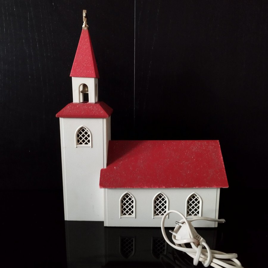 Retro- Julkyrka adventskyrka med belysning samt spelverk röd färg.