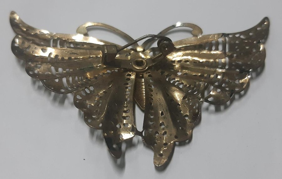 Antique gold metal butterfly brooch