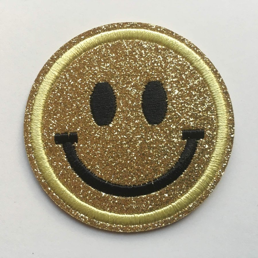 Smiley guld/gul glittrig - Stryka på - Iron On - Tygmärke