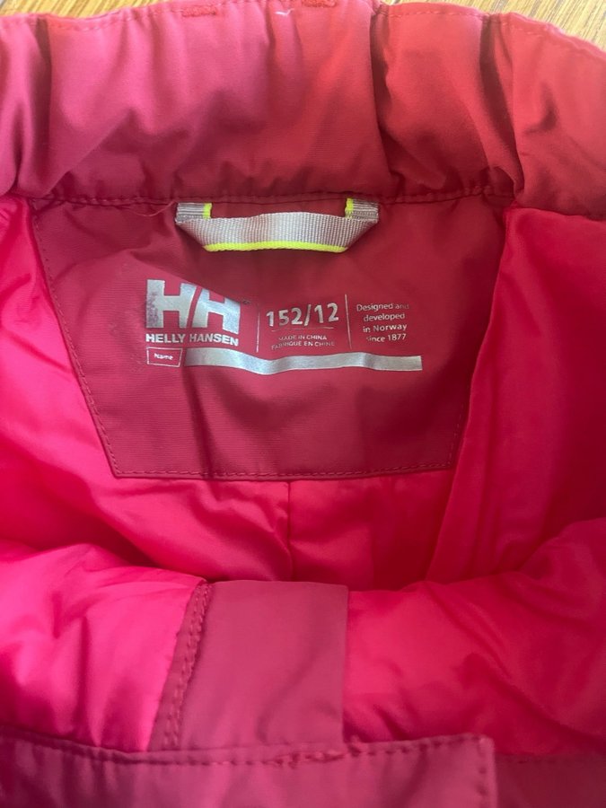 Helly Hansen rosa skidbyxor storlek 152/12