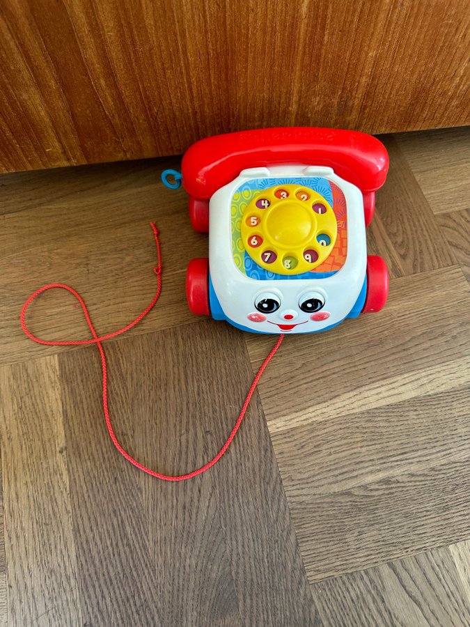 Fisher Price telefon färgglad leksak retro 70-tal