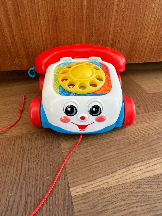 Fisher Price telefon färgglad leksak retro 70-tal