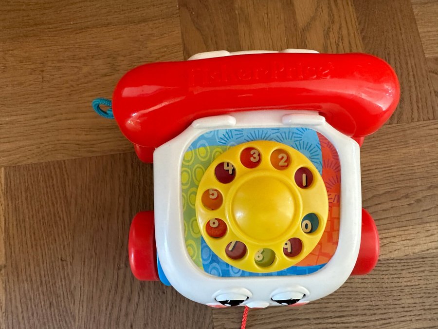 Fisher Price telefon färgglad leksak retro 70-tal