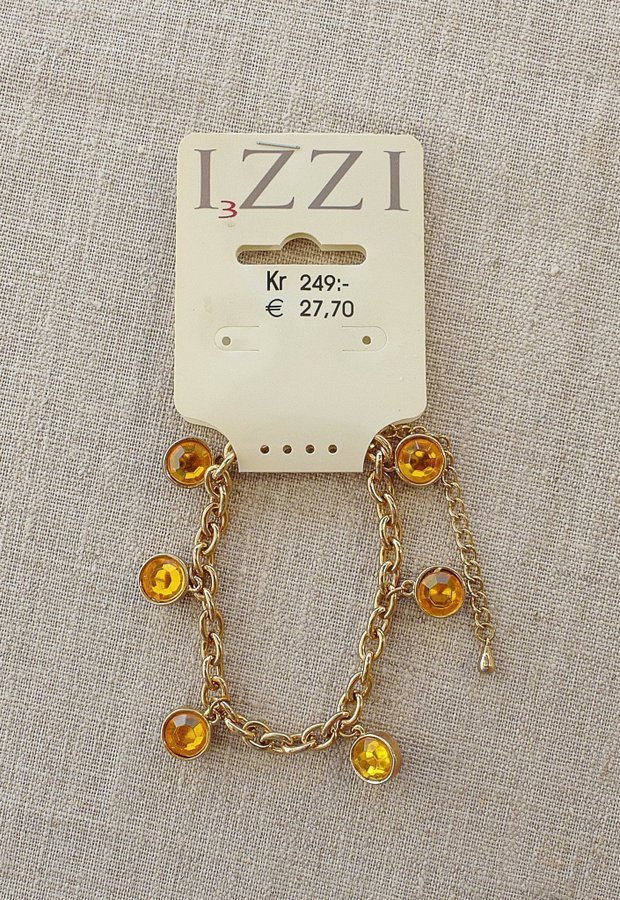 Armband med guldfärgad kedjelänk och 6 infattade fasettslipade stenar i strass