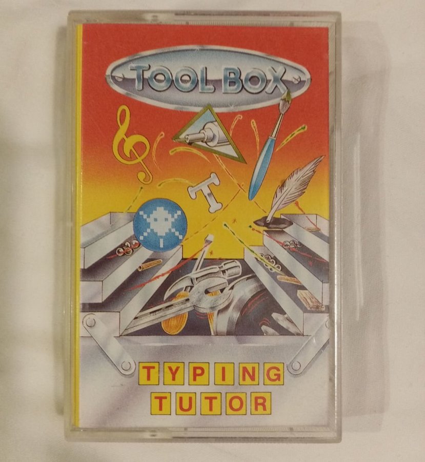 Typing Tutor (Domark-Toolbox) [Svart Kassett med Grått Tryck] - Commodore 64