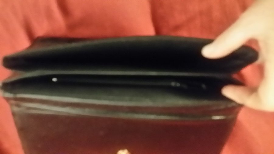 väska kuvertväska svart retro