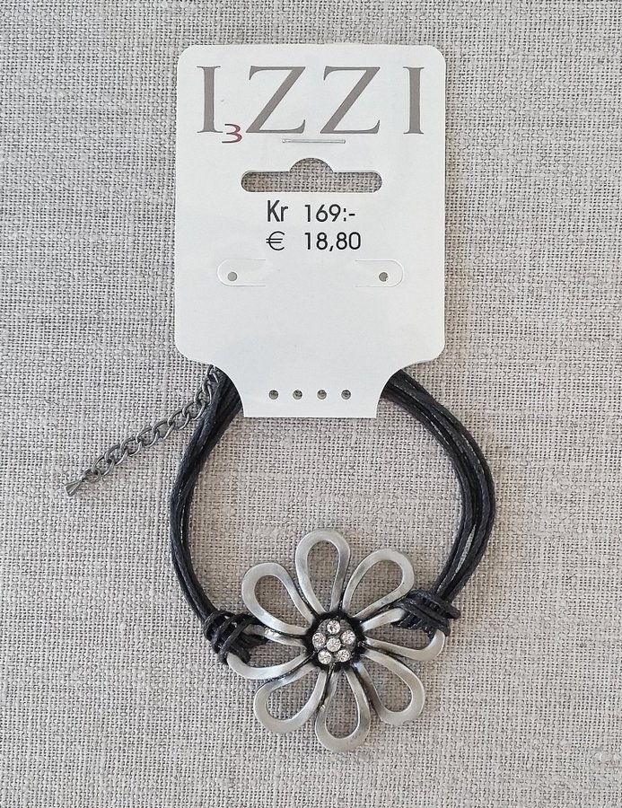 Armband med blomformat hänge och 6 små strasstenar Nytt