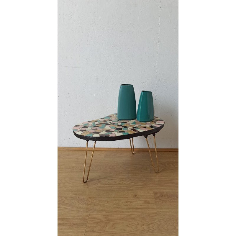 Unusual coffee table on three legs 