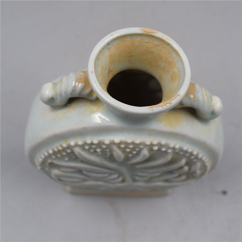 Song Dynasty white porcelain Ding kiln carved pattern