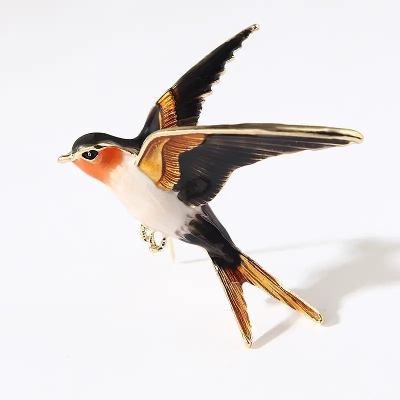 Snygg brosch fågel brooch pin flygande svalor bird natur trädgård vingar fåglar