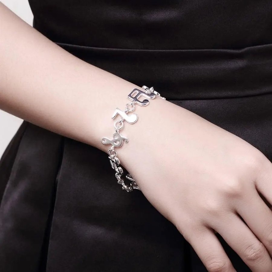 Elegant musiknot Sterling silver armband 925 stämplad berlock pläterad t g-klav