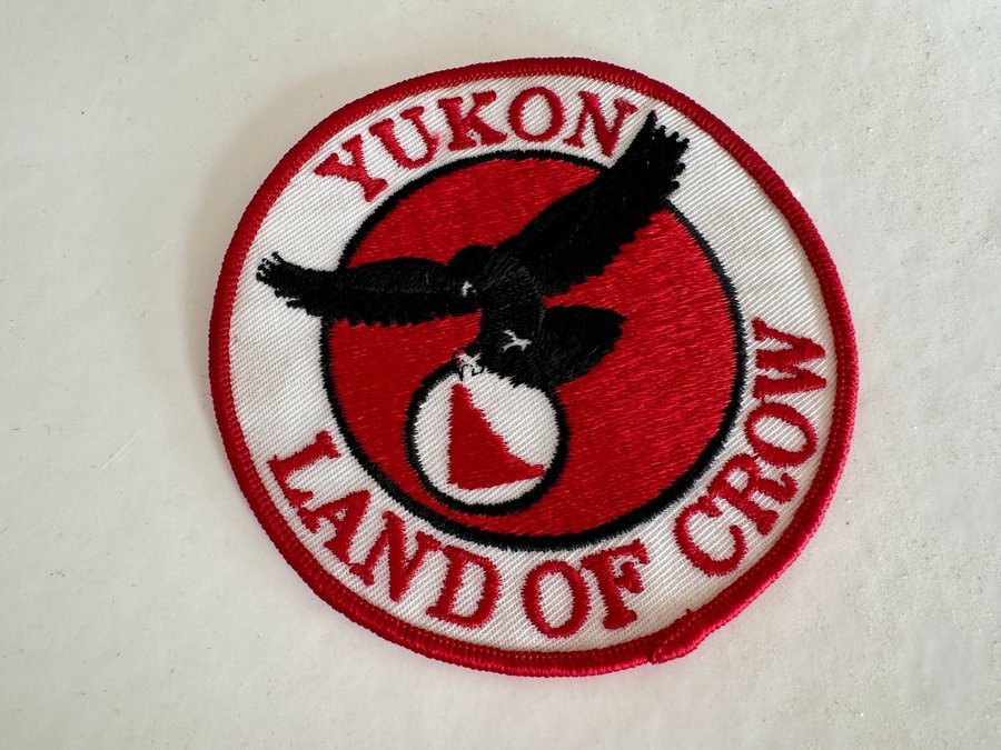 Yukon Kanada Canada land of Crow 100 mm brett tygmärke Kuvert E