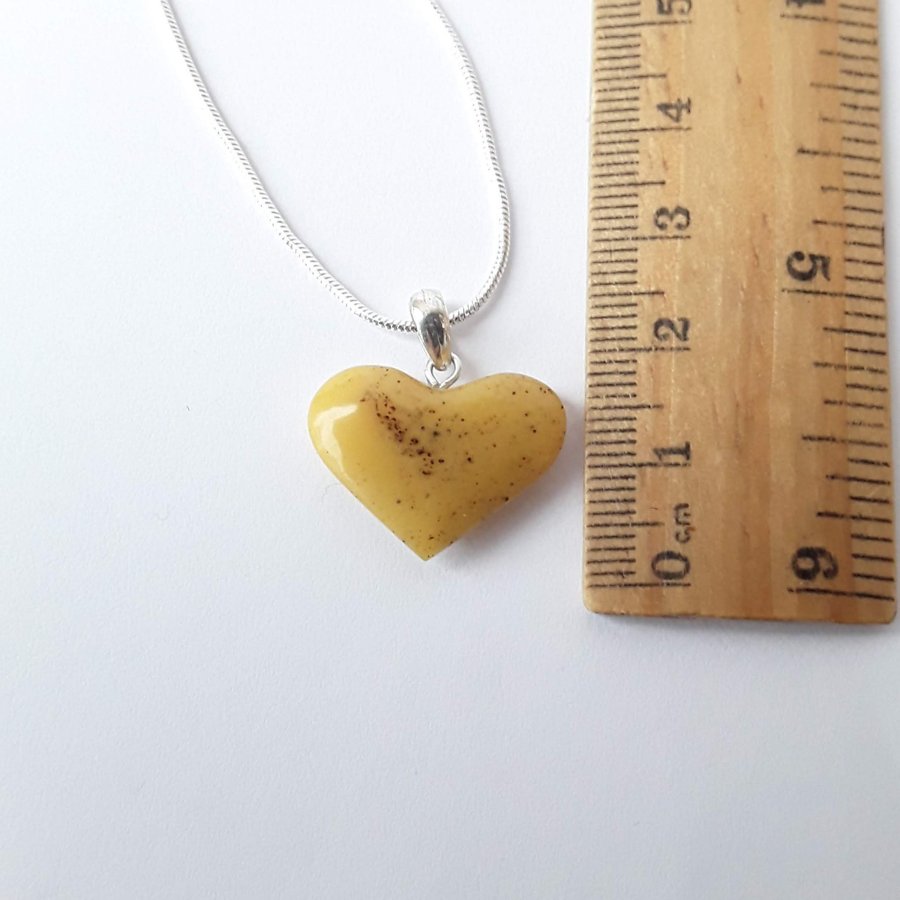 Yellow Baltic amber gemstone Heart pendant on a silver color chain Heart jewelry