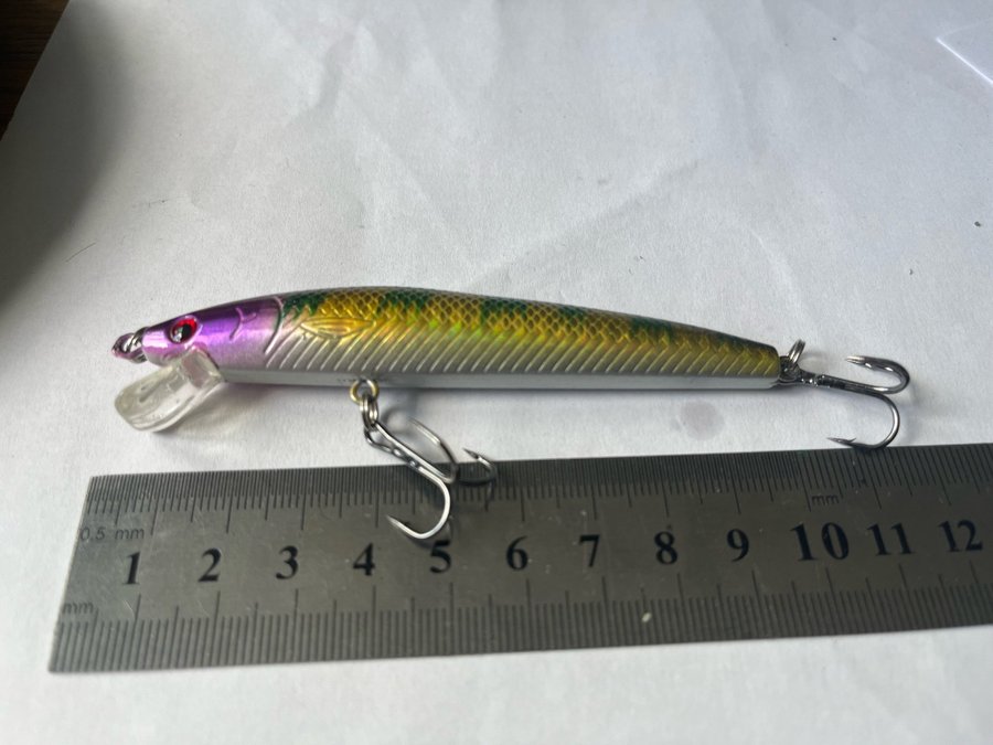 Flytande wobbler med rasselkulor ca 9gr och 10cm