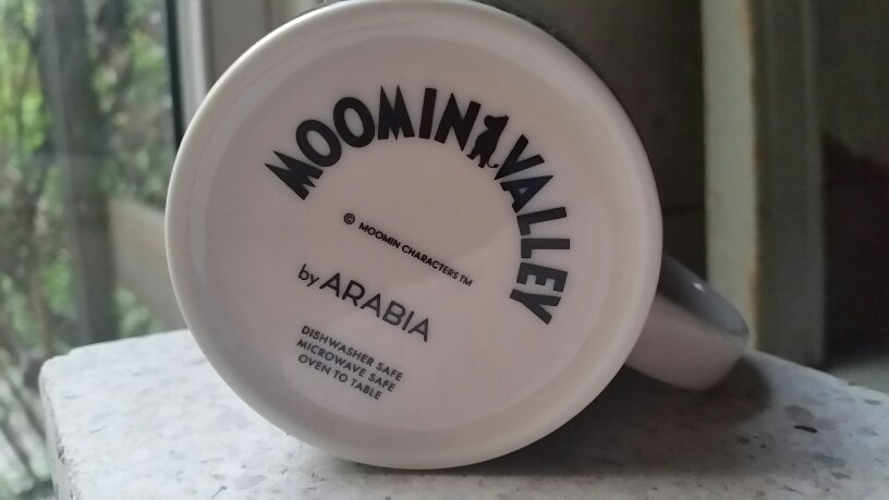 Den gyllene svansen Muminmugg Arabia 1:a sort Etikett Moominvalley 2019 Utgått
