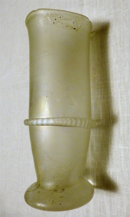 Kosta unik - Vas i fri form m metallånga som formade ytbeläggningen