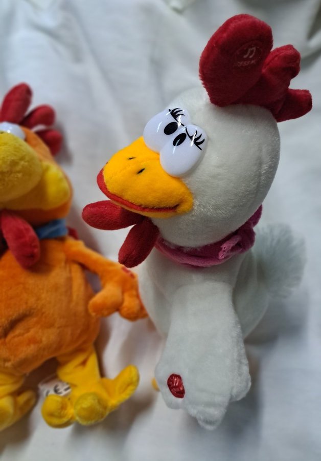 Plush Couple Rooster and hen sing and cluck when you squeeze their neck