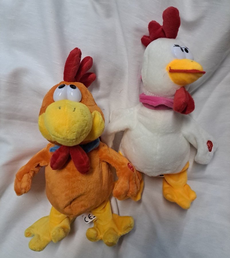Plush Couple Rooster and hen sing and cluck when you squeeze their neck