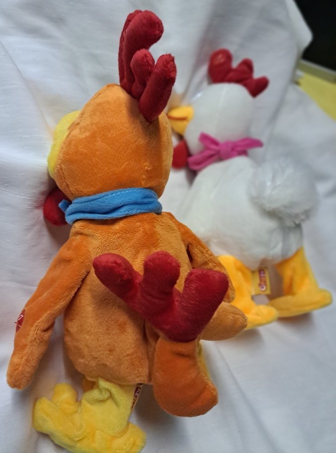 Plush Couple Rooster and hen sing and cluck when you squeeze their neck